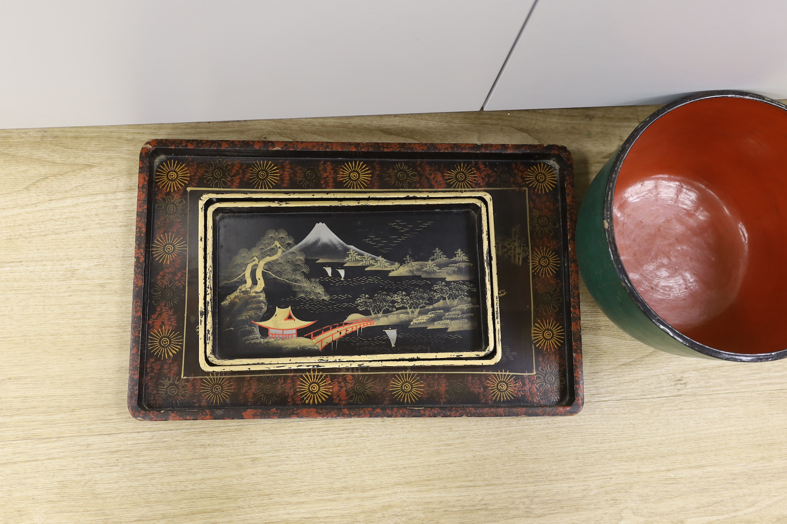 A Thai lacquer bowl and three Chinese lacquer rectangular trays, bowl 18.5cm high